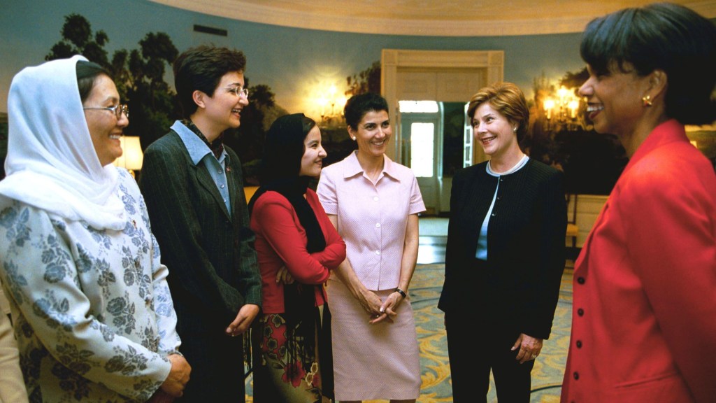 July 16, 2003: Laura Bush and National Security Advisor Dr. Condoleezza Rice, right, meet with the US-Afghan Women's Council in the Diplomatic Room.